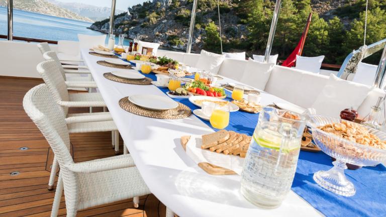 Breakfast on the gulet. Halcon Del Mar is moored in the bay